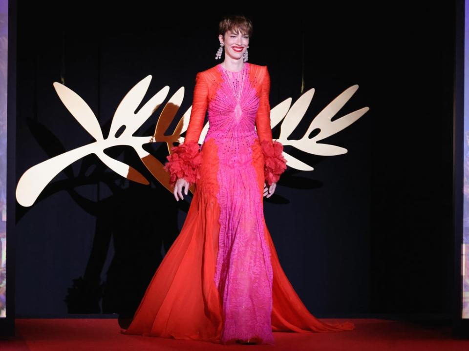 Jury member Rebecca Hall arrives on stage during the opening ceremony for the 75th annual Cannes film festival at Palais des Festivals (Getty Images)