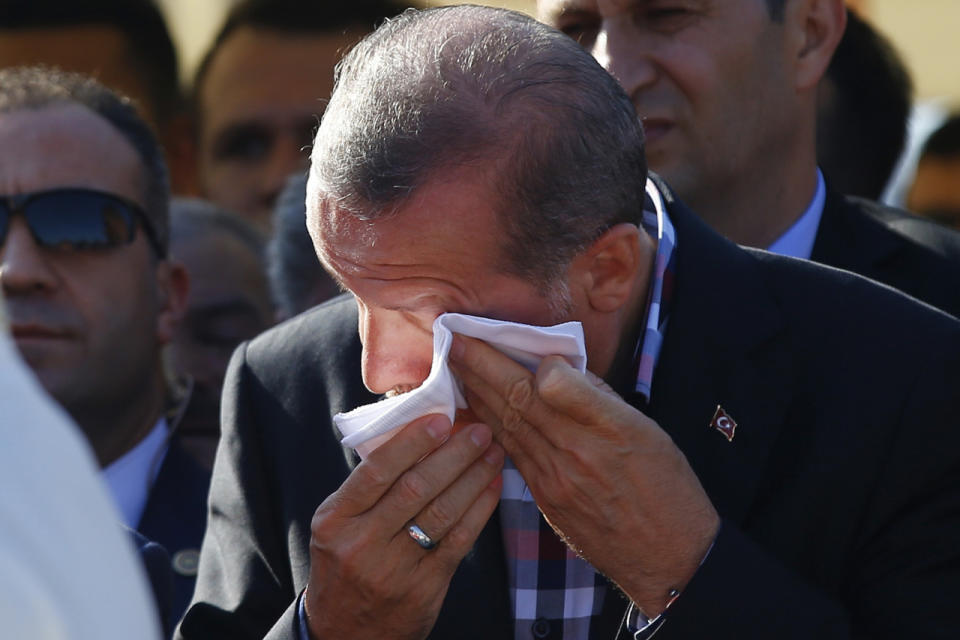 Erdogan wipes tears 