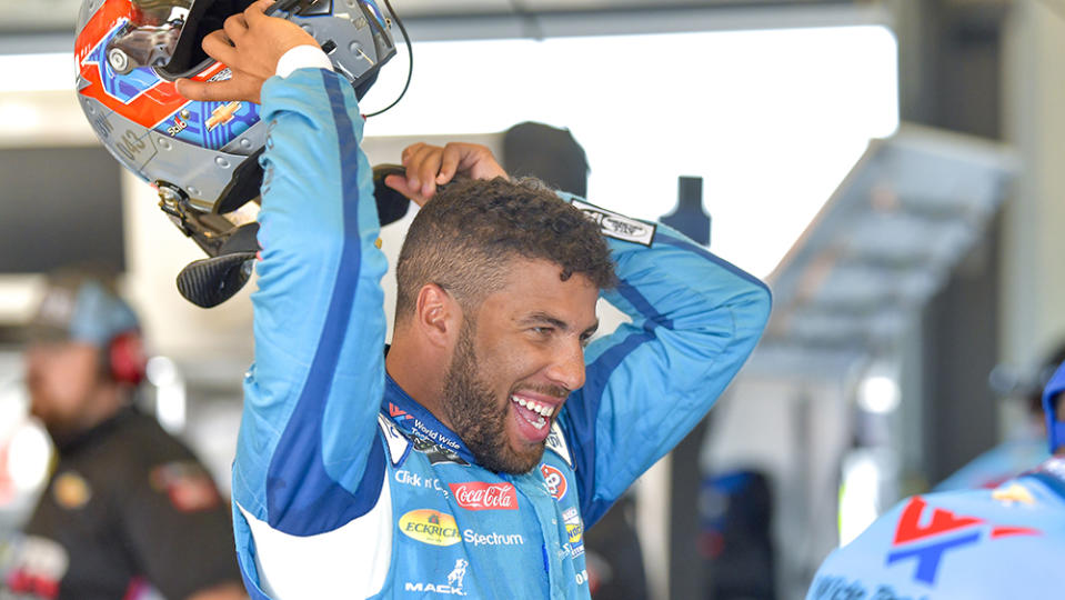 Darrell Wallace Jr. (43) puts his helmet on and gets ready to head out to the racetrack during practice for the NASCAR Quaker State 400 race at Kentucky Speedway, Friday, July 13, 2018, in Sparta CA. (Gavin Baker/NKP via AP) MANDATORY CREDIT