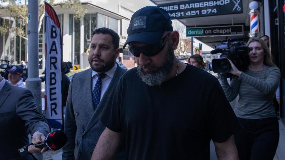 Lawyer Fadi Abbas with the father of Adam Yuron, a driver accused of being involved in a fatal crash in Western Sydney in August that killed two children. Picture: NCA Newswire / Nathan Schmidt