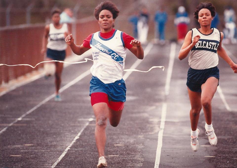 Howard's Terri Wanamaker breaks the tape.