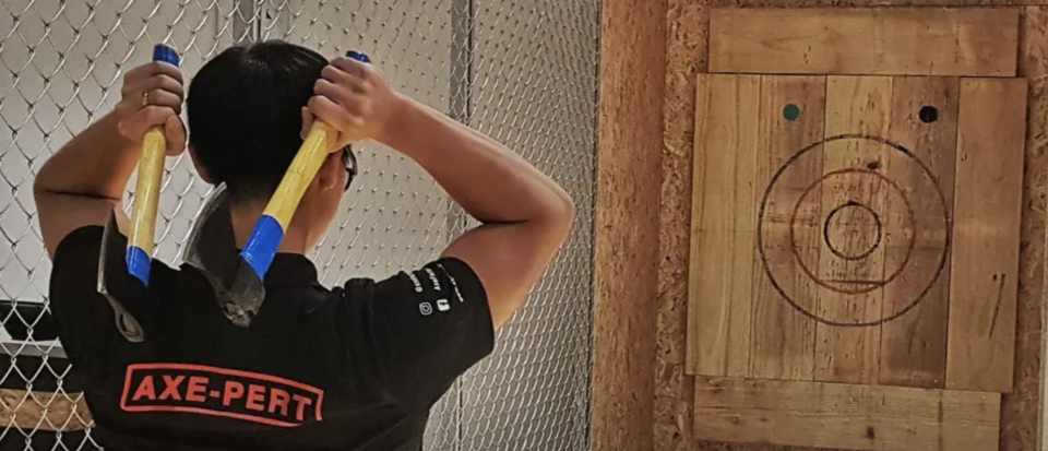 Axe Throwing Experience in Singapore. PHOTO: Klook