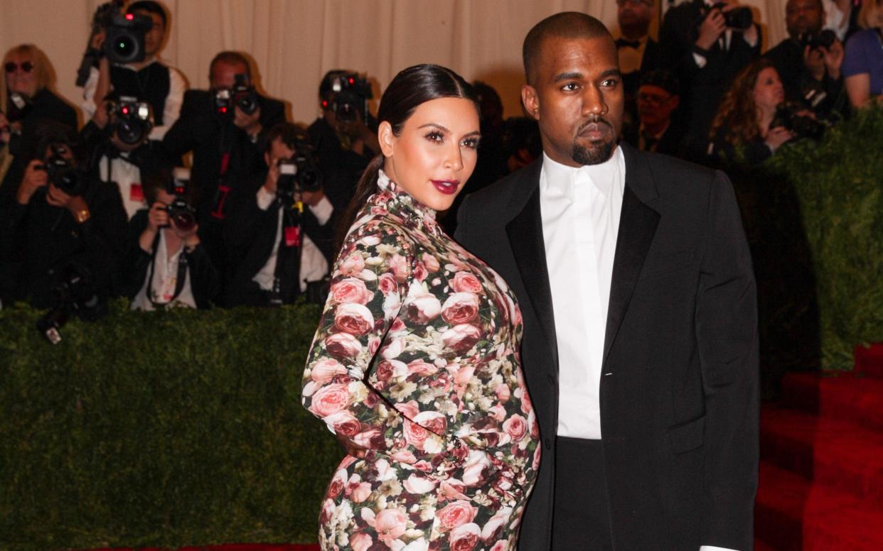 Kim Kardashian at the 2013 Met Gala, wearing Givenchy while pregnant with daughter North West - Rex