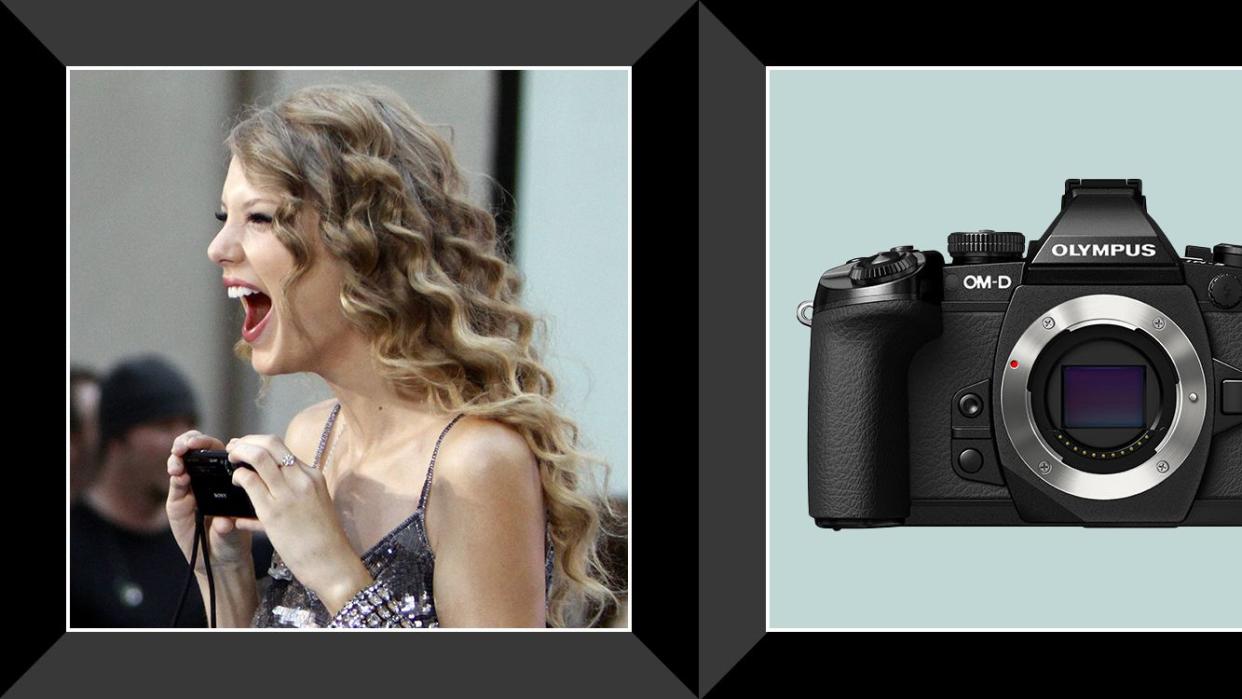 taylor swift holding a digital camera in 2010, olympus mirrorless digital camera