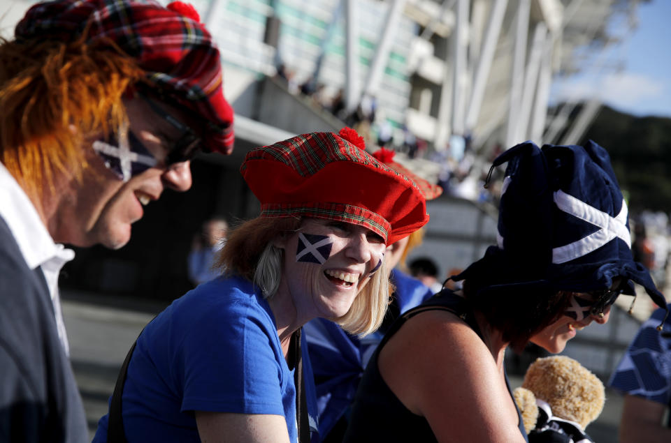 Scottish fans wait to enter the stadium ahead of the Rugby World Cup Pool A game at Shizuoka Stadium Ecopa between Scotland and Russia in Shizuoka, Japan, Wednesday, Oct. 9, 2019. (AP Photo/Christophe Ena)