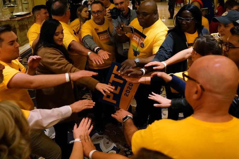 Supporters of Pete Buttigieg cheer outside a First in the West Event at the Bellagio Hotel in Las Vegas