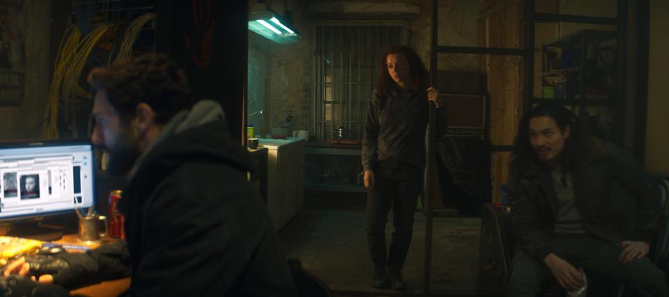 Karli Morgenthau (Erin Kellyman, center) hides out from the authorities with fellow Flagsmashers Nico (Noah Mills) and Dovich (Desmond Chiam) in "The Falcon and the Winter Soldier."