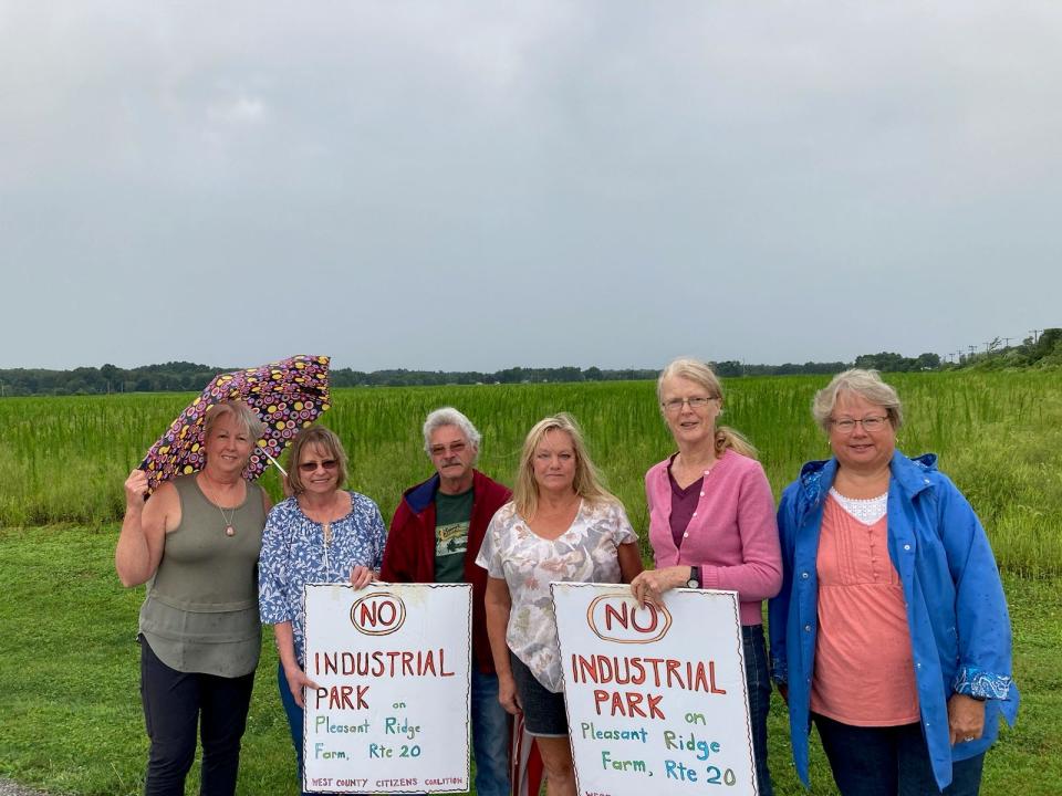 Members of the West County Citizens Coalition, shown here on Aug. 23, 2023, stand in front of the proposed site for a new business park in Fairview Township. From left are Sandy Anderson, Jodi Fairchild, Jack Pesta, Valerie Pesta, Issy Lawrie and Travis Pettis.