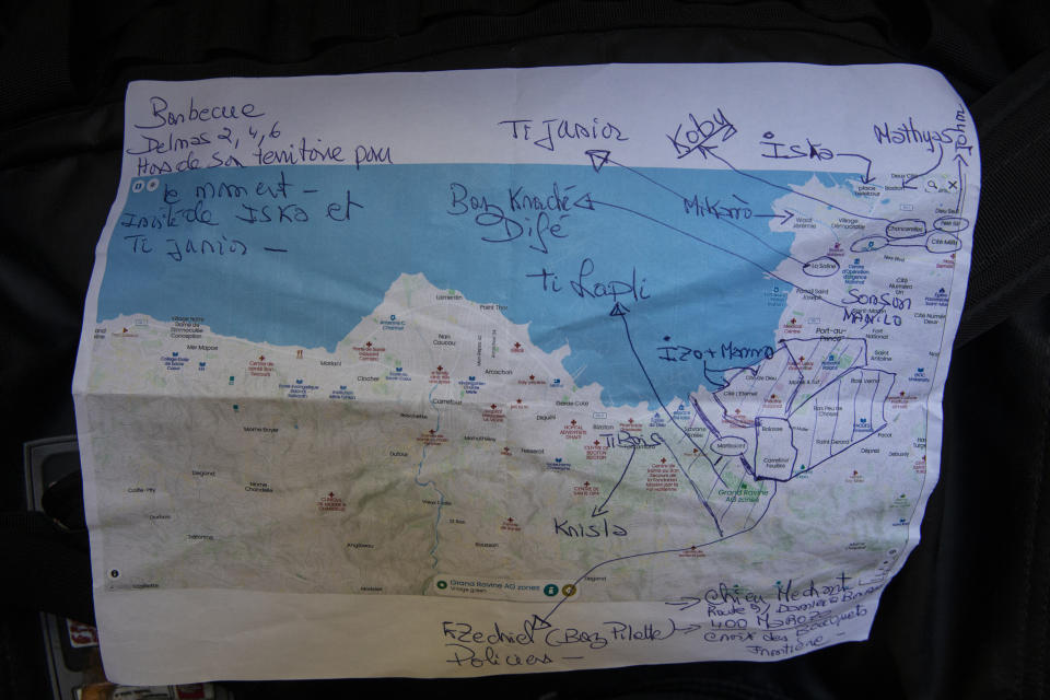 A map created by a businessman who asked not to be identified, notes the different territories controlled by gangs in Port-au-Prince, Haiti, Thursday, Oct. 7, 2021. Jimmy Cherizier, aka Barbecue, a former policeman who leads the G9 gang coalition, controls the coastal strip of Port-au-Prince. (AP Photo/Rodrigo Abd)