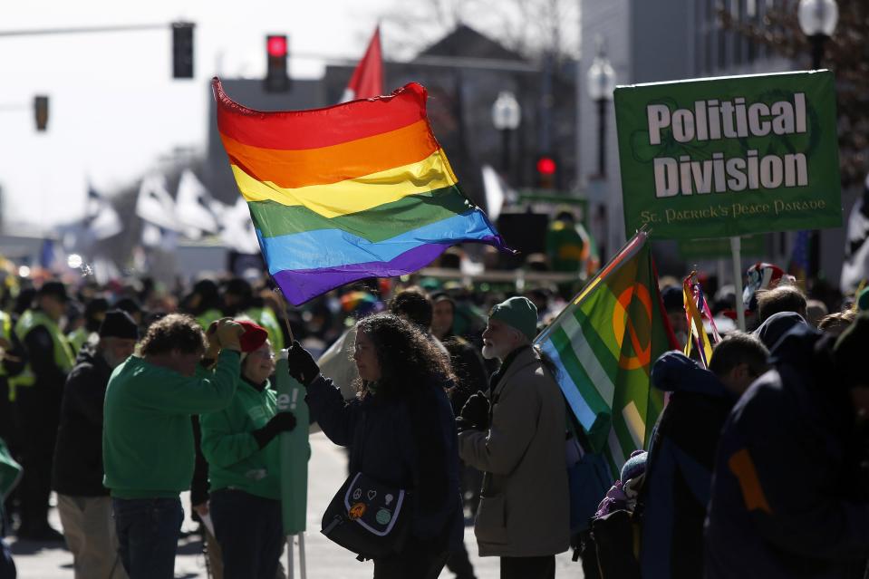 Gay rights advocates prepare to march in an equality parade immediately after the annual South Boston St. Patrick's Day parade in Boston, Massachusetts March 16, 2014. Boston's Irish-American mayor skipped the parade on Sunday after failing to hammer out a deal with organizers to allow a group of gay and lesbian activists to march openly. REUTERS/Dominick Reuter (UNITED STATES - Tags: ANNIVERSARY TRAVEL SOCIETY)