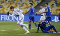 Football Soccer - Dynamo Kiev v Maccabi Tel Aviv - UEFA Champions League Group Stage - Group G - Olympic stadium, Kiev, Ukraine - 09/12/15 Dynamo Kiev's Denys Garmash celebrates after scoring a goal. REUTERS/Valentyn Ogirenko