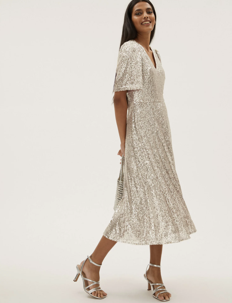 The silver, shimmery dress is bound to be a show-stopper this party season. (Marks & Spencer)