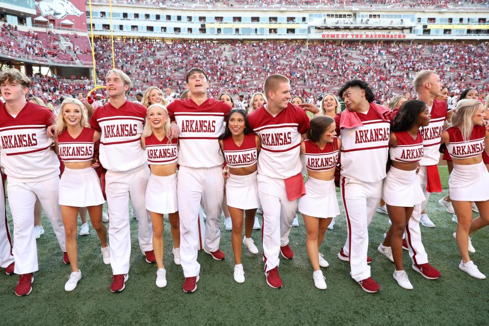 Sep 3, 2022; Fayetteville, Arkansas, USA; Arkansas Razorbacks cheerleaders celebrate after the game against the Cincinnati Bearcats at Donald W. Reynolds Razorback Stadium. Arkansas won 31-24. Mandatory Credit: Nelson Chenault-USA TODAY Sports