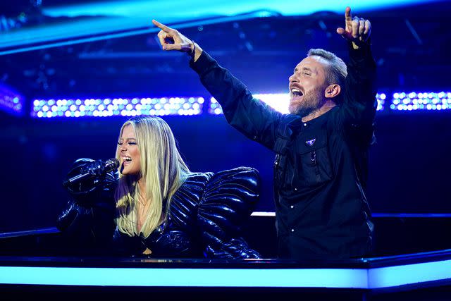 <p>Ian West/PA Images/Getty</p> Bebe Rexha and David Guetta in Germany in November 2022