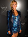 <p>The singer sparkles in blue sequins at the launch of her fashion line in London in September.</p>