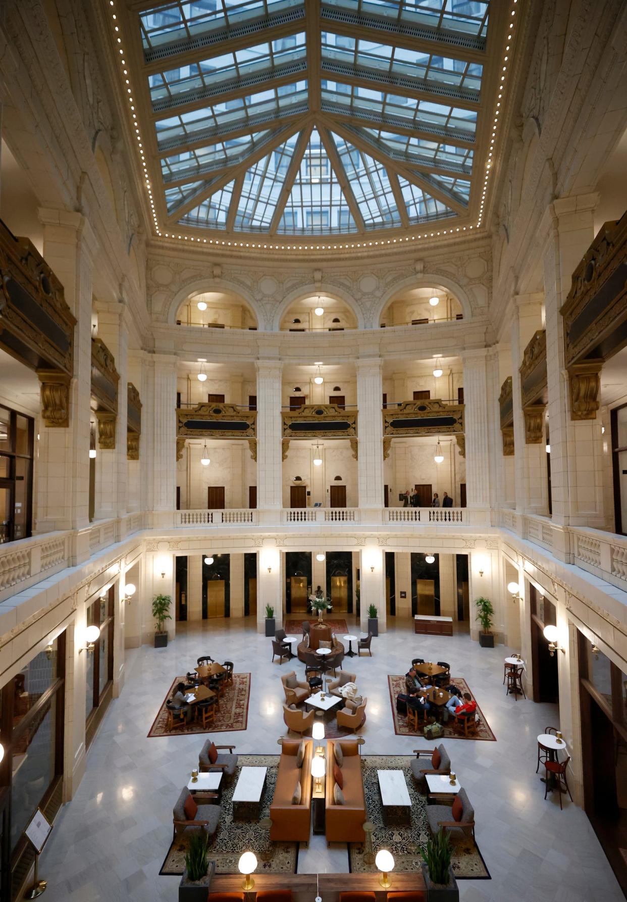 A look at the lobby area with lots of marble and seating at the Hotel David Whitney, Autograph Collection on Wednesday, March 27, 2024. This area is one of many new changes to The David Whitney Building at Grand Circus Park that used to be an Aloft Detroit, a Marriott property.