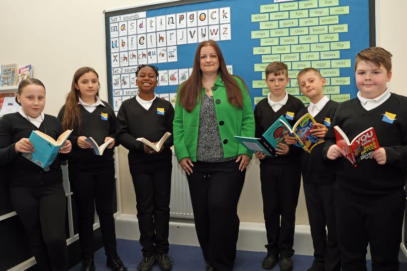 Good as gold, pupils from River Tees Primary Academy celebrate with headteacher Sophie Moss after securing a ‘good’ rating from Ofsted inspectors.