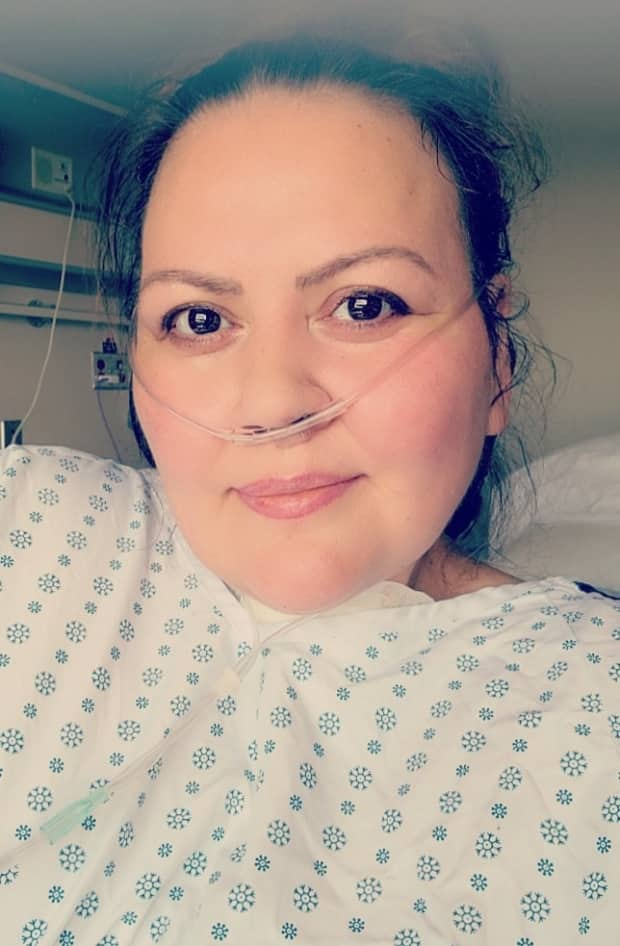 Lisa Anderson of Dawson City, Yukon, is still recovering from COVID-19 in hospital in Vancouver. After her harrowing experience, she's willing to get the vaccine.   (Submitted by Lisa Anderson - image credit)