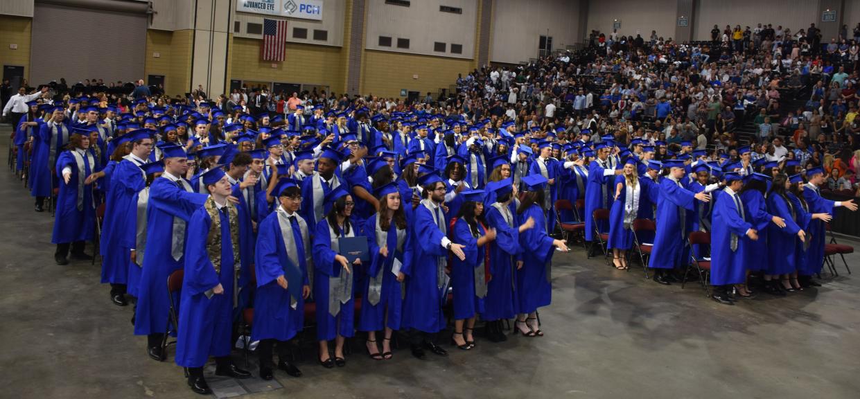 H.L. Bourgeois High graduates chant and do the tomahawk chop accompanied by the school's band during their commencement May 23, 2023, at the Barry Bonvillain Civic Center in Houma.