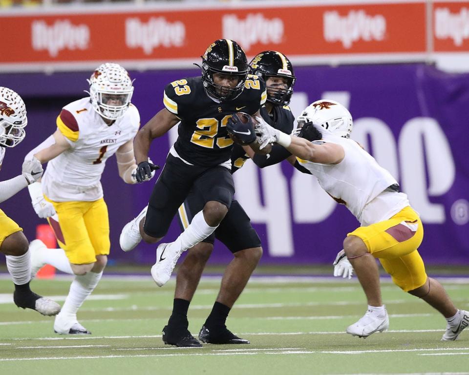 Rams' running back Abu Sama carried the ball for a first down against Ankeny in the Class 5A state championship game in November.