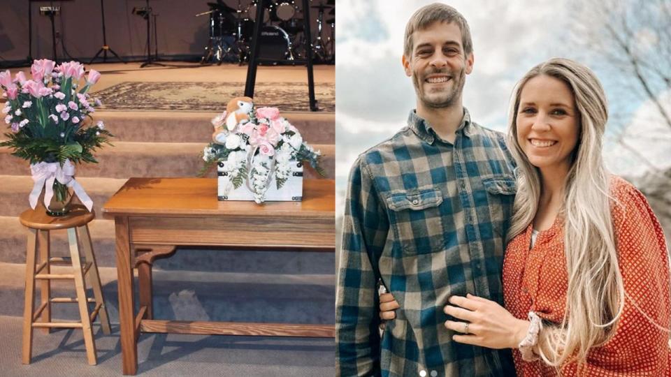 Jill and Derick Dillard with a split of a white casket