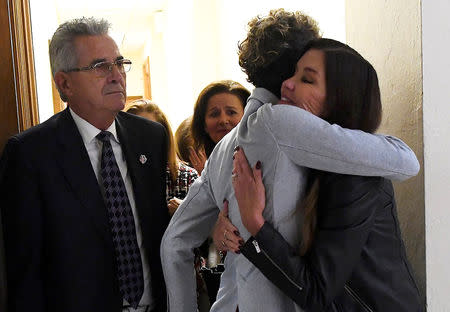 Andrea Constand embraces Janice Dickinson after the sentencing of Bill Cosby in his sexual assault trial at the Montgomery County Courthouse in Norristown, Pennsylvania. Mark Makela/Pool via REUTERS