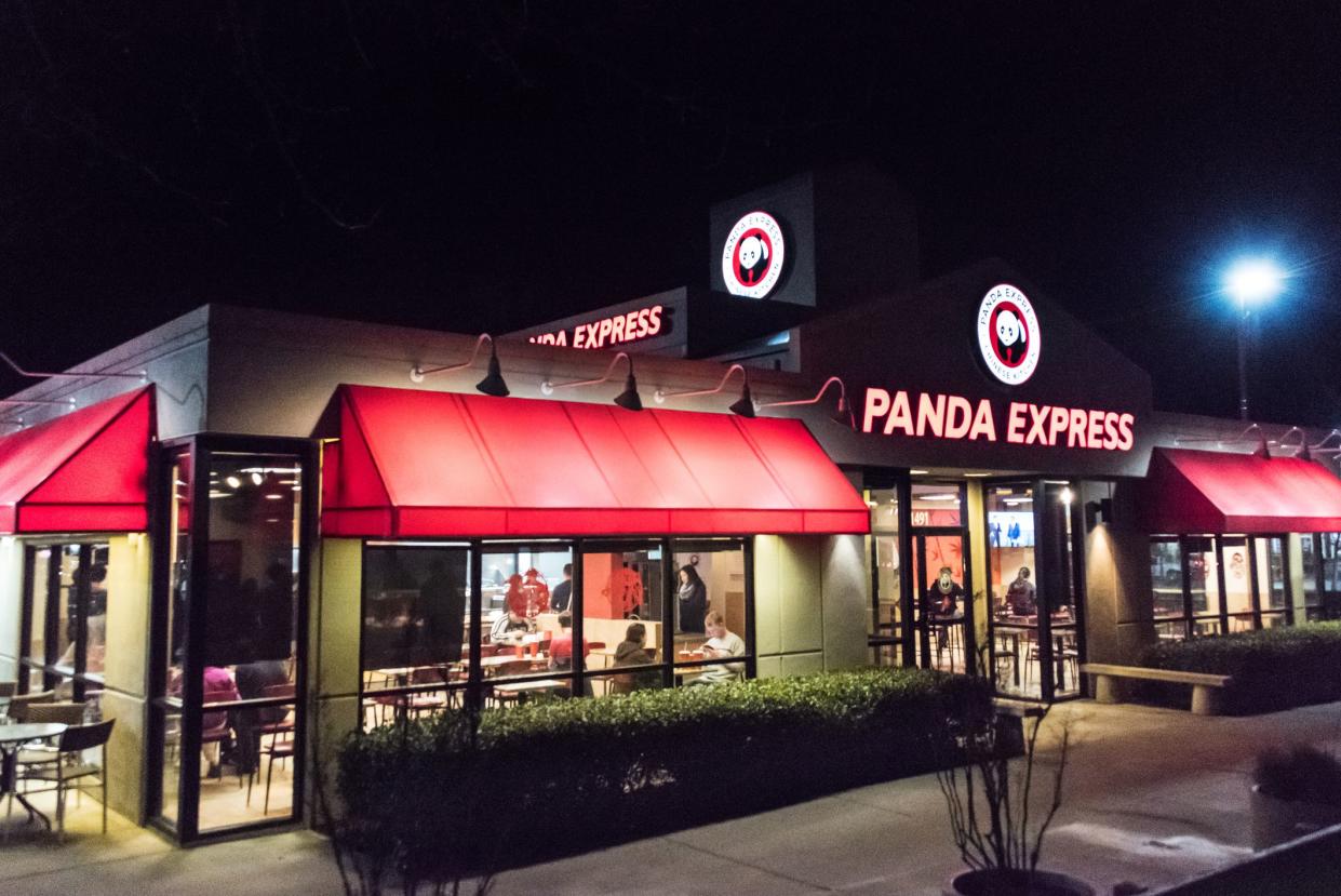 Exterior of busy Panda Express at night