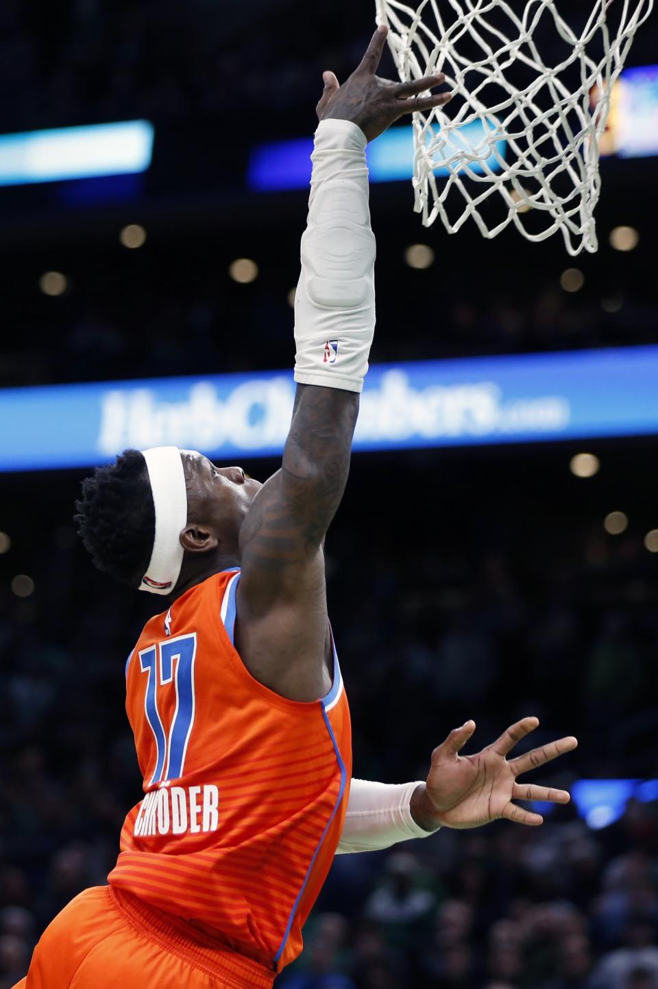 Oklahoma City Thunder's Dennis Schroder makes a basket during the second half of an NBA basketball game against the Boston Celtics, Sunday, March, 8, 2020, in Boston. (AP Photo/Michael Dwyer)