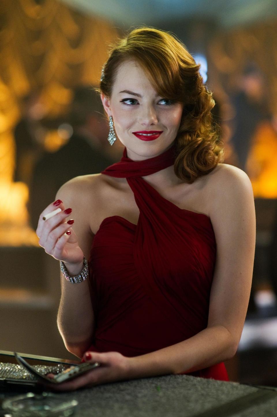 This film image released by Warner Bros. Pictures shows Emma Stone, as Grace Faraday in “Gangster Squad." (AP Photo/Warner Bros. Pictures, Wilson Webb)