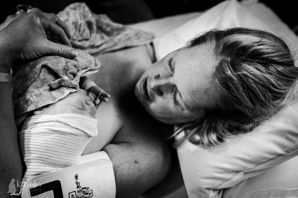 When the baby was finally born,&nbsp;Nikki and her husband Chris breathed a sigh of relief and showered him with love. (Photo: K Reeder Photography)