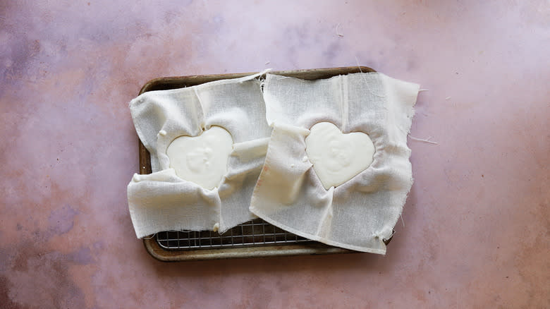 Cheese added to heart molds