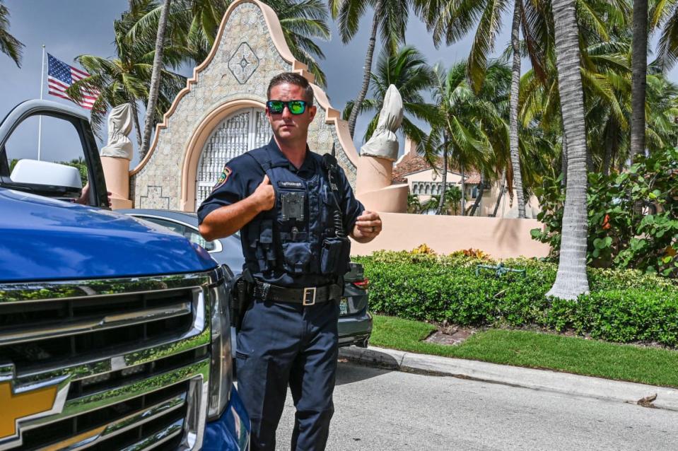 <div class="inline-image__caption"><p>Local law enforcement officers in front of the home of former President Donald Trump at Mar-A-Lago in Palm Beach, Florida on Aug. 9, 2022.</p></div> <div class="inline-image__credit">Giorgio Viera/AFP via Getty</div>