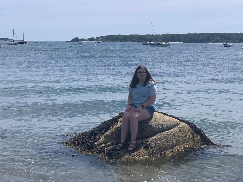 matthew wilson fiancee sitting on rock