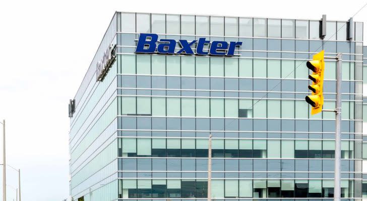 The logo for Baxter International Inc (BAX) is displayed on an office building.