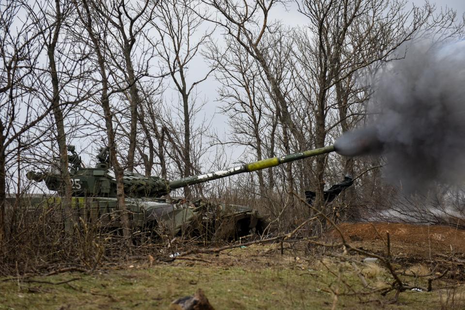 Ukrainian soldiers in a T-72 tank fire on Russian positions in Donetsk (EPA)