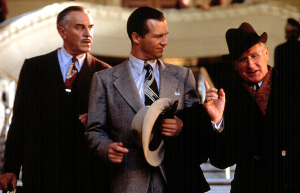 <p>After playing countless villains and suspicious characters, Landau (pictured, left) embraced the role of dream-making financier Abe Karatz in <a rel="nofollow" href="https://www.yahoo.com/movies/tagged/francis-ford-coppola" data-ylk="slk:Francis Ford Coppola;elm:context_link;itc:0;sec:content-canvas" class="link ">Francis Ford Coppola</a>‘s drama about automobile innovator Preston Tucker (<a rel="nofollow" href="https://www.yahoo.com/movies/tagged/jeff-bridges" data-ylk="slk:Jeff Bridges;elm:context_link;itc:0;sec:content-canvas" class="link ">Jeff Bridges</a>, center, with Lloyd Bridges, right). The film earned Landau his first Oscar nomination. (Photo: Everett) </p>