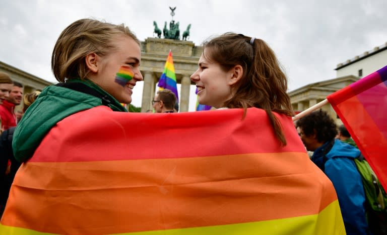 Two young woman pictured on June 30, the day the German parliament backed gay marriage