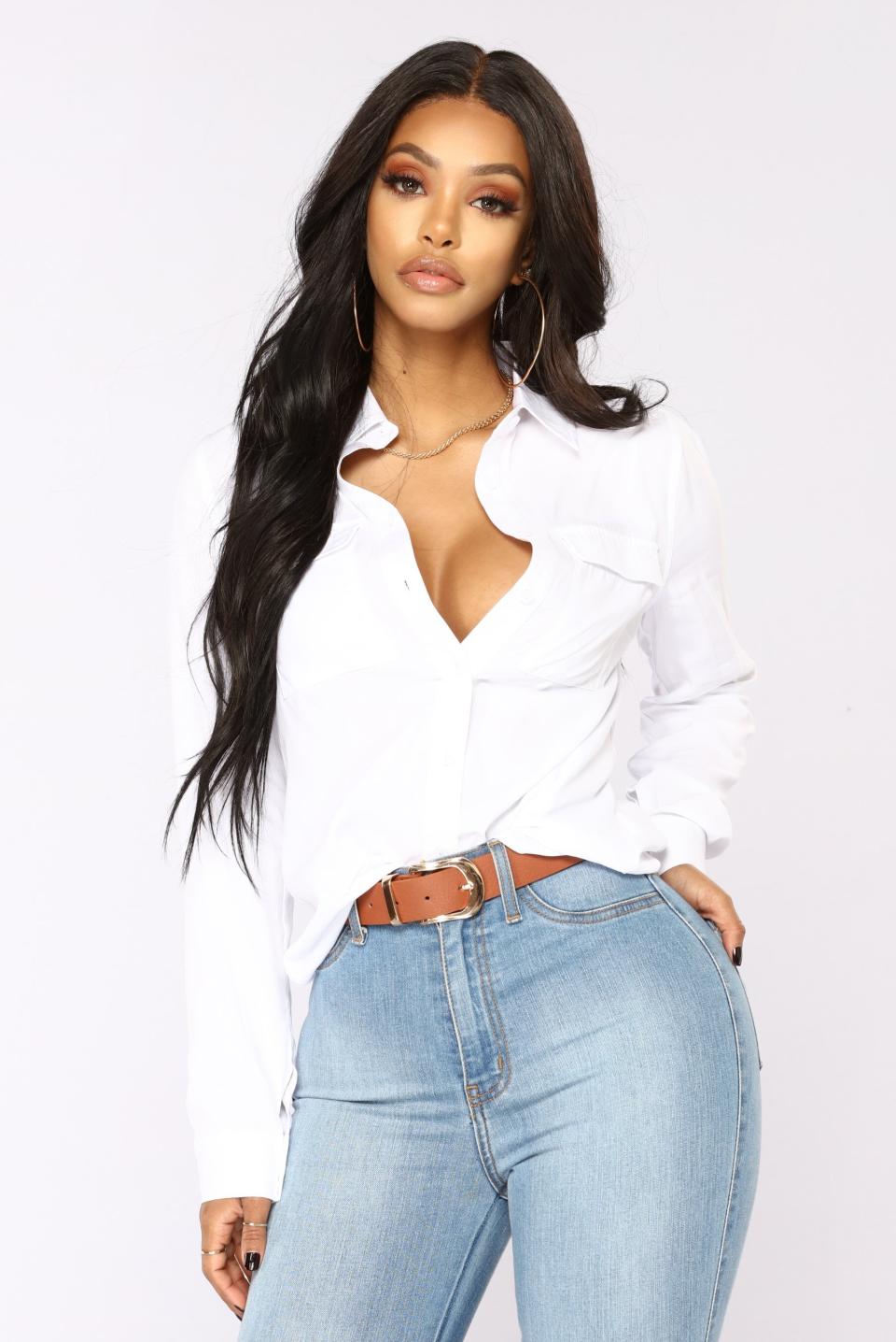 Crisp and white, try pairing this top with exciting prints and colors lurking within your wardrobe this spring.&nbsp;<br /><br /><strong><a href="https://www.fashionnova.com/products/you-better-work-shirt-ii-offwhite?refSrc=1321190817916&amp;nosto=productpage-nosto-3" target="_blank" rel="noopener noreferrer">Get the&nbsp;Fashion Nova You Better Work Shirt II, $24.99</a>.</strong>