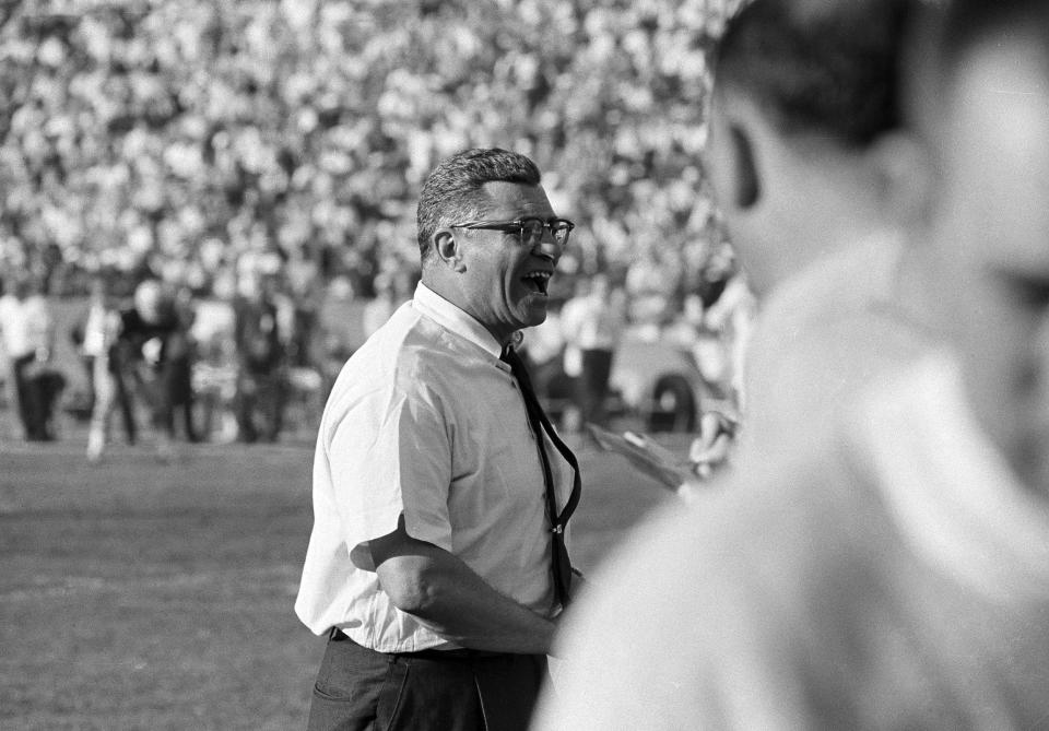 FILE - Green Bay Packers coach Vince Lombardi cheers from the sideline during Super Bowl I against the Kansas City Chiefs in Los Angeles, Jan. 15, 1967. The Packers beat the Chiefs 35-10. Frank Gifford famously noted Lombardi was “shaking like a leaf” when the broadcaster did his pregame interview with the Hall of Fame coach.(AP Photo/File)