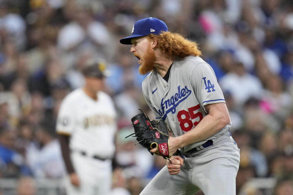 Los Angeles Dodgers starting pitcher Dustin May reacts after the last out during the sixth inning of a baseball game against the San Diego Padres, Saturday, May 6, 2023, in San Diego. (AP Photo/Gregory Bull)