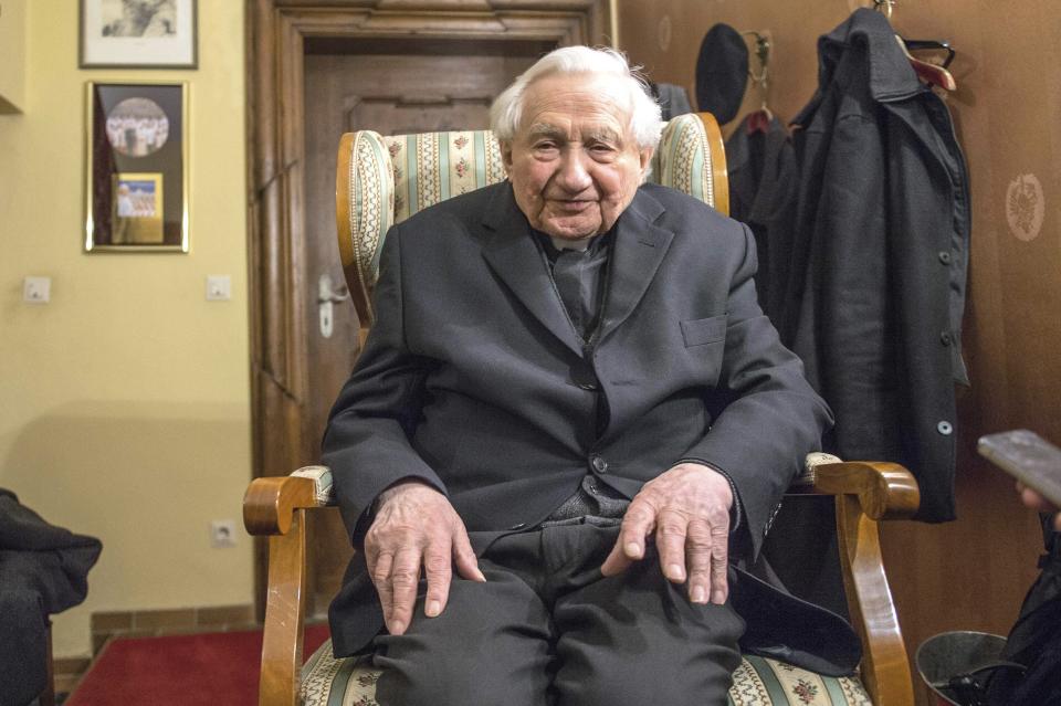 FILE - In this Monday Feb. 11, 2013 file photo, Georg Ratzinger, brother of Pope Benedict XVI , sits in his house in Regensburg, southern Germany. The Rev. Georg Ratzinger, the older brother of Emeritus Pope Benedict XVI, who earned renown in his own right as a director of an acclaimed German boys’ choir, has died at age 96. The Regensburg diocese in Bavaria, where Ratzinger lived, said in a statement on his website that he died on Wednesday, July 1, 2020. (AP Photo/dpa, Armin Weigel)/dpa via AP)