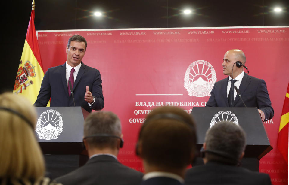 Spain's Prime Minister Pedro Sanchez, left and North Macedonia's Prime Minister Dimitar Kovacevski, right, attend a joint news conference following their talks in the government building in Skopje, North Macedonia, on Sunday, July 31, 2022. Spanish Prime Minister Pedro Sanchez is on a one-day official visit to North Macedonia as a part of his Western Balkans tour. (AP Photo/Boris Grdanoski)
