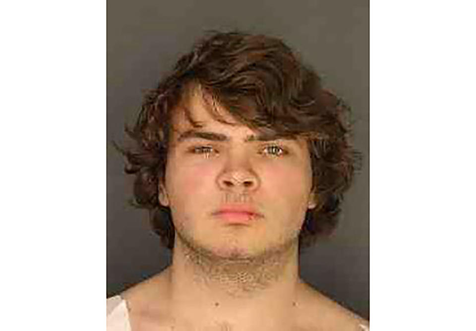 FILE - This booking photo provided by the Erie County, N.Y., District Attorney's Office shows Payton Gendron. Gendron, the white gunman who pleaded guilty to state charges in the massacre of 10 Black people at a Buffalo, N.Y., supermarket, would be willing plead guilty to federal charges if spared the death penalty, his lawyer said in court Friday, Dec. 9, 2022. (Erie County District Attorney's Office via AP, File)