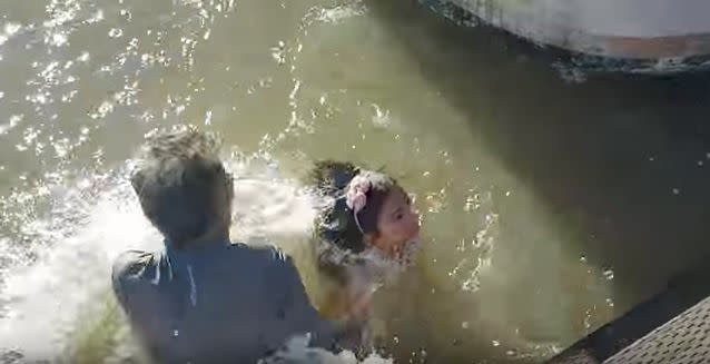 A family member jumped in to her rescue immediately. Source: YouTube/Michael Fujiwara