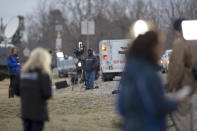 <p>Media outlets stage near an entrance to Marshall County High School after a deadly shooting at the school in Benton, Ky., Jan. 23, 2018. (Photo: Ryan Hermens/The Paducah Sun via AP) </p>