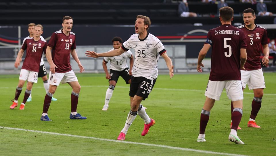 Muller celebrates scoring against Latvia (Getty Images)