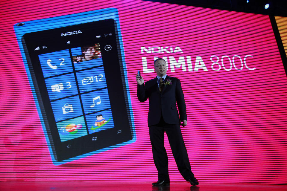 Nokia CEO Stephen Elop announces the launch of the company's new Lumia 800C smartphone in Beijing, China, Wednesday, March 28, 2012. Struggling cellphone maker Nokia launched its first smartphone design for China on Wednesday, looking to the world's biggest mobile market to help drive a turnaround.(AP Photo/Ng Han Guan)