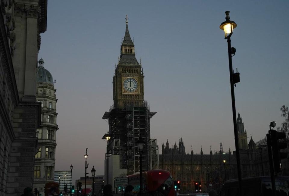 The sun sets over the Houses of Parliament in Parliament Square (Aaron Chown/PA) (PA Wire)