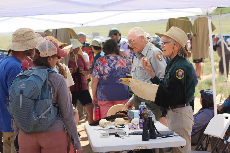 Doug Crispin, of the National Park Service, along with a volunteer teach spectators about the California condor