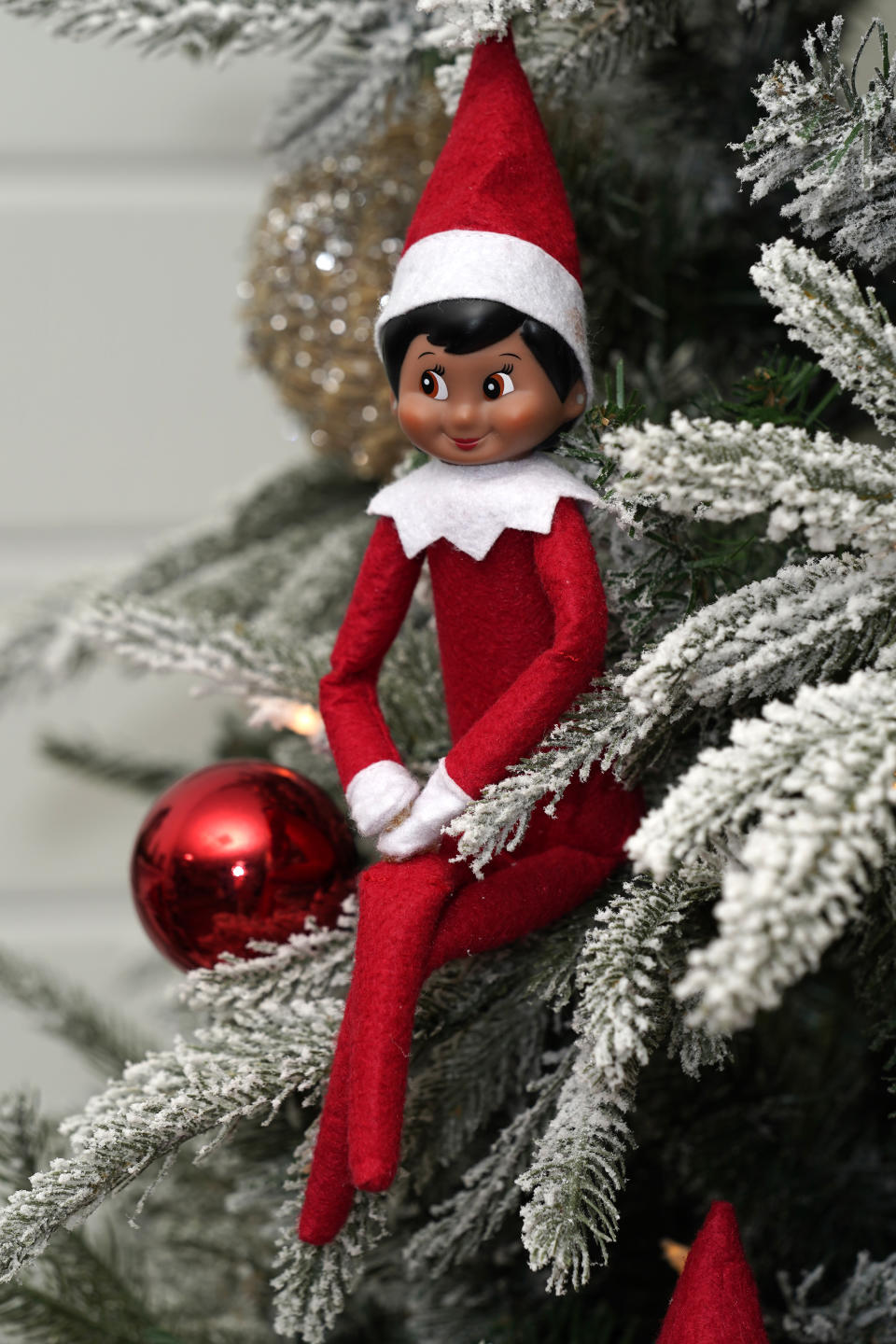 Elf on the Shelf figures are displayed at the company's studio Thursday, Aug. 27, 2020, in Atlanta. Thousands of suppliers routinely rely on credit insurance to cover potential losses if any of the retailers they work with can’t pay for the goods they’ve ordered. But now insurers are scaling back on coverage because they are unwilling to take a chance on retailers that are struggling to survive during the pandemic. Christa Pitts, founder and co-CEO of The Lumistella Company, which produces toys, books and other products under the Elf on the Shelf and Elf Pets brands, says her retail orders were covered 100% before the pandemic. Now, only 50% are covered, forcing her to rethink who she will sell to. (AP Photo/John Bazemore)